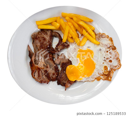 Veal with eggs and potatoes on a plate 125189533
