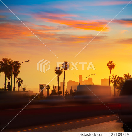 LA Los Angeles sunset skyline with traffic California 125189719