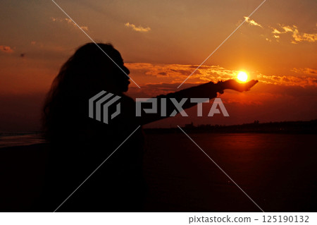 The sun to catch in the palm of your hand 125190132