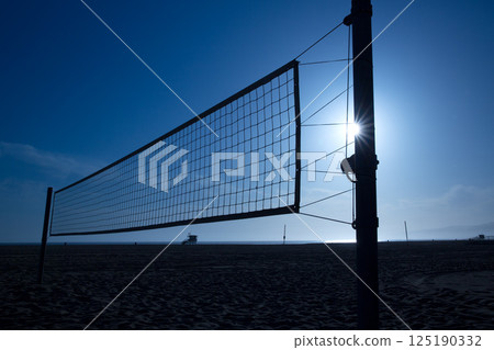 beach voley net in Santa Monica at sunset California 125190332