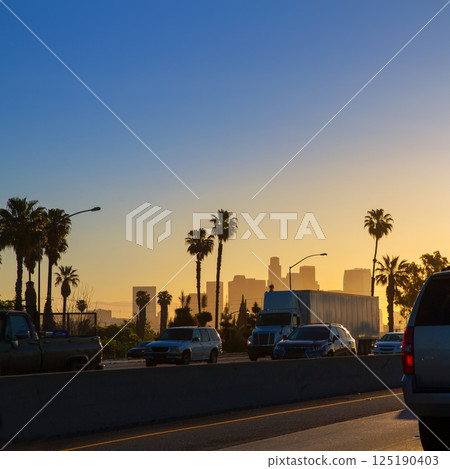 LA Los Angeles sunset skyline with traffic California 125190403