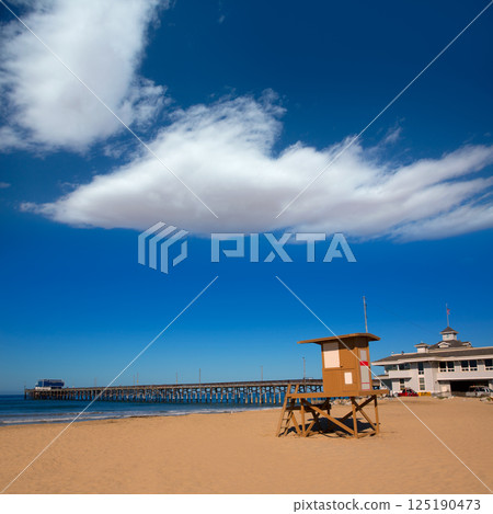Newport pier beach with lifeguard tower in California Newport pier beach with lifeguard tower in California 125190473