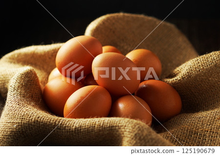 Fresh eggs (red eggs) 125190679