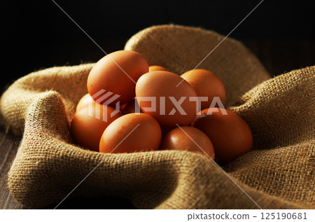 Fresh eggs (red eggs) 125190681