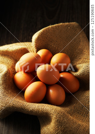 Fresh eggs (red eggs) 125190685