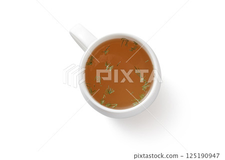 Herbal tasty aromatic tea in cup isolated on empty white background Herbal tasty aromatic tea in cup isolated on empty white background 125190947