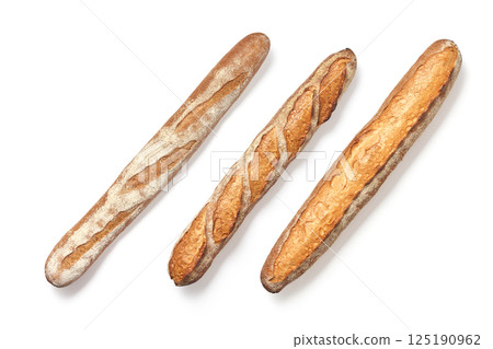 Pattern from fresh baked crunchy french baguette isolated white background 125190962