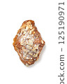 Homemade crunchy croissant with almond flakes and sugar powder isolated 125190971
