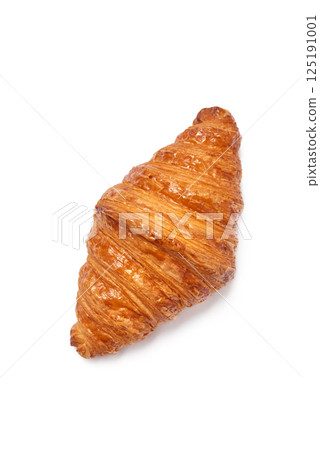 Homemade delicious freshly baked croissant on white background 125191001