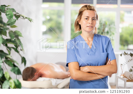 the foreground woman demonstrates rejuvenating massages 125191293