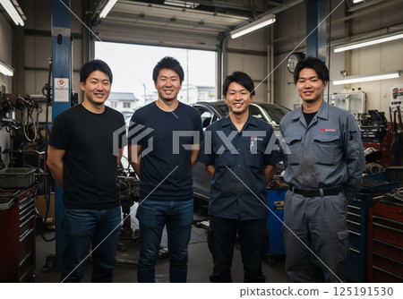 Members working at a small repair shop 125191530