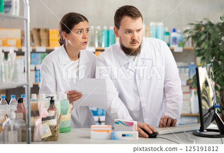 Director and pharmacist analyze documents, are horrified by results of work in current half-year Director and pharmacist analyze documents, are horrified by results of work in current half-year 125191812