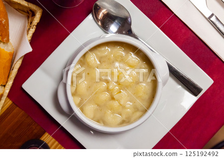 Tasty dish of japanese cuisine snail soup in bowl Tasty dish of japanese cuisine snail soup in bowl 125192492