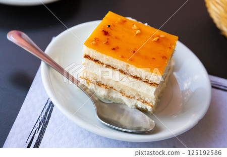 Tarta de whisky - cake soaked in whiskey. Spanish dish Tarta de whisky - cake soaked in whiskey. Spanish dish 125192586