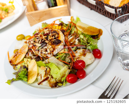 Goat cheese salad with pear Goat cheese salad with pear 125192605