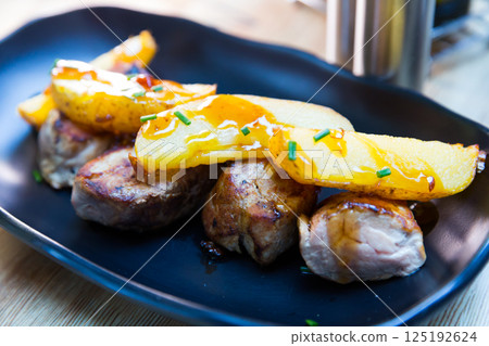 Sirloin medallion with potatoes 125192624