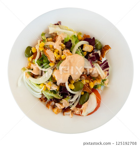 Caesar salad with chicken pieces, tomatoes on a white plate Caesar salad with chicken pieces, tomatoes on a white plate 125192708