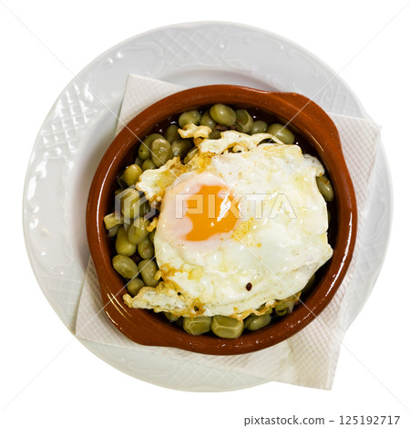 Spanish beans with egg in a plate 125192717