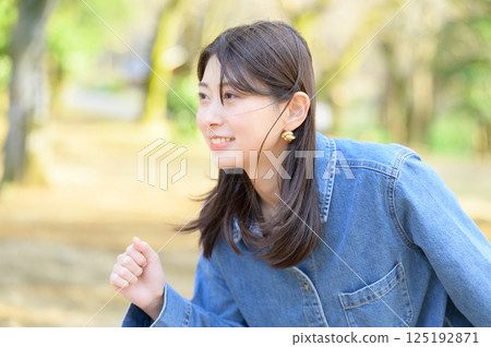 Young woman running Young woman running 125192871