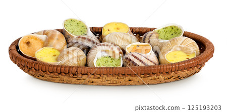 escargot snail filled with different fillings in a wicker basket isolated on white background 125193203