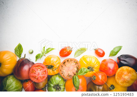 Mixed tomatoes top view. Mixed tomatoes top view. 125193483
