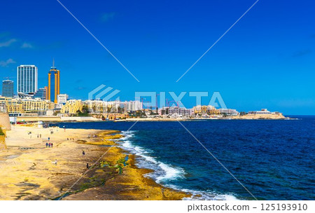 View of the coastline in Sliema, skyscrapers in Paceville district, Malta 125193910