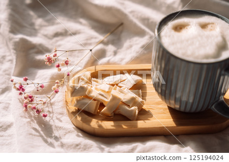 A pile of white of snus pads for breakfast with coffee 125194024