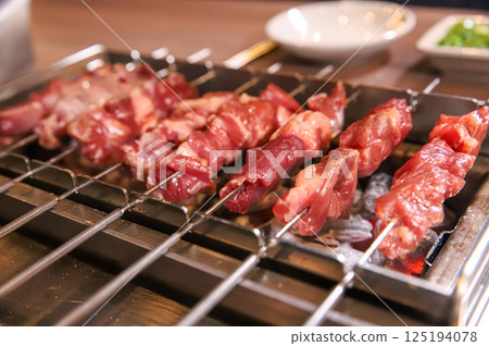 Chinese food. Grilled lamb skewers.	 125194078