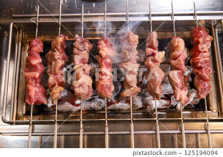Chinese food. Grilled lamb skewers. Chinese food. Grilled lamb skewers. 125194094