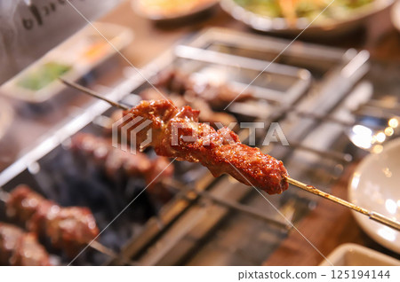 Chinese food. Grilled lamb skewers.	 125194144
