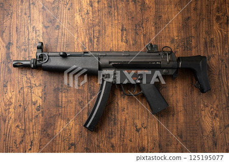 Airsoft gun on the ground Airsoft gun on the ground 125195077
