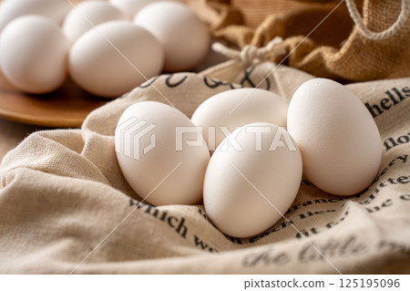Eggs piled on a cloth 125195096