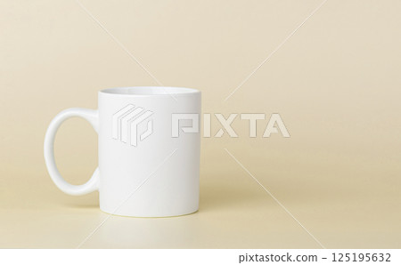 white cup for tea or coffee on a yellow background white cup for tea or coffee on a yellow background 125195632