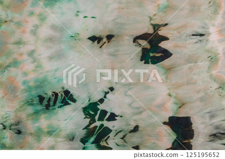 abstract pattern on silk fabric texture in green tones abstract pattern on silk fabric texture in green tones 125195652
