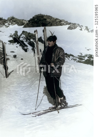Vintage portrait of a young athletic woman on a ski slope. Retro photo 1985. 125195965