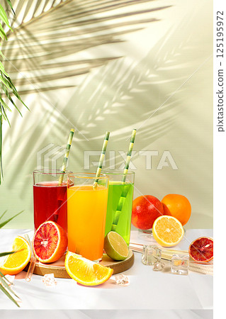 Assortment of summer dietary citrus drinks. Cocktails and juices from orange, lime and grapefruit. Concept of tropical party and relaxation, advertising of healthy lifestyle. Assortment of summer dietary citrus drinks. Cocktails and juices from orange, lime and grapefruit. Concept of tropical party and relaxation, advertising of healthy lifestyle. 125195972