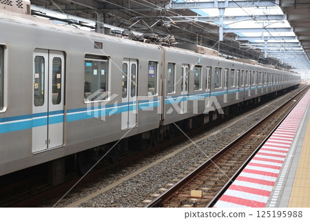 "Eidan 05 Series Train (Aluminum Recycled Car)" parked at Myoden Station on the Tozai Line 125195988