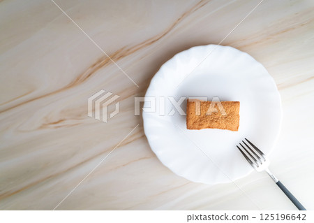 Financiers on a simple white plate④ Financiers on a simple white plate④ 125196642