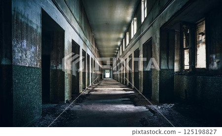 A corridor in an old abandoned building. 125198827