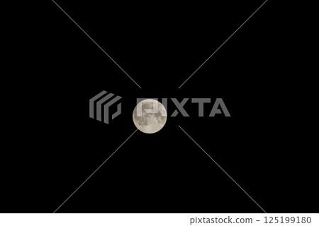 Full moon floating in the night sky Full moon floating in the night sky 125199180