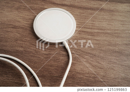 Wireless charger, magnetic charging modern equipment of mobile phone. Wireless charger, magnetic charging modern equipment of mobile phone. 125199863