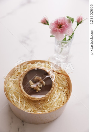 Mini roses and chocolate candy Mini roses and chocolate candy 125202696