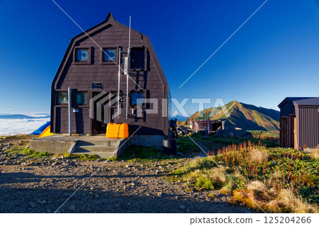 Morning view of Gonishi hut and the Iide mountain range and Mount Dainichi Morning view of Gonishi hut and the Iide mountain range and Mount Dainichi 125204266