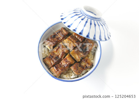 Aerial view of eel bowl on white background Aerial view of eel bowl on white background 125204653