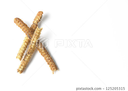 Eel bone rice crackers photographed against a white background 125205315