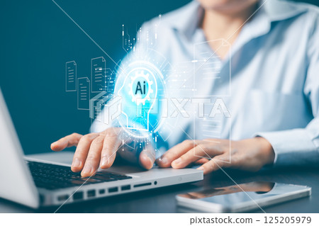 Businesswoman working on laptop computer to document management online. electronic document on a digital document on a virtual laptop computer screen, Paperless workplace idea, document management. 125205979