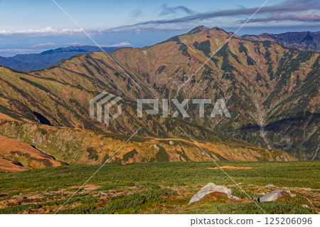 Mt. Kitamata and Mt. Baikabiki seen from the climb of Mt. Iide Honzan in the Iide mountain range Mt. Kitamata and Mt. Baikabiki seen from the climb of Mt. Iide Honzan in the Iide mountain range 125206096