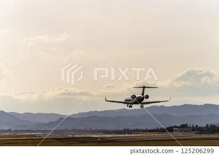 Sendai Airport at dusk, airplane landing, Natori City, Miyagi Prefecture 125206299