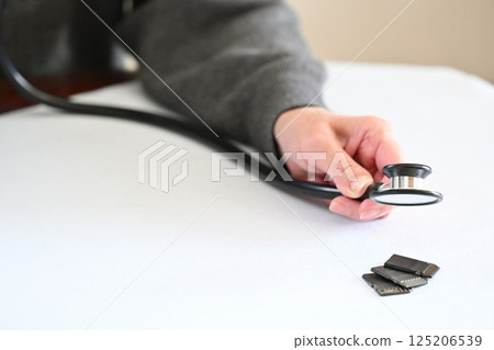 SD card and stethoscope SD card and stethoscope 125206539