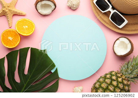 Tropical leaves and fruits summer concept frame on pink background. 125206902